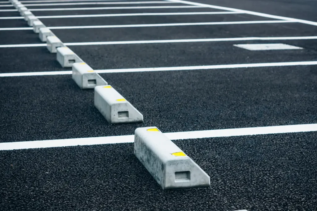 Asphalt carpark with wheel stops built by Asphalt Carpark Construction Wairarapa and Manawatu Concrete.